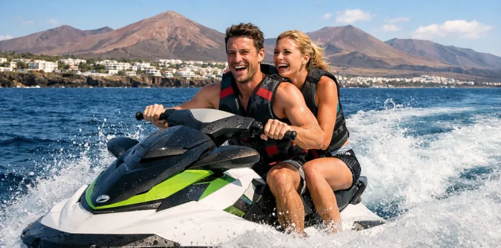 Couple enjoying jet ski ride in Lanzarote waters near Puerto del Carmen Atlantic Ocean summer watersports experience